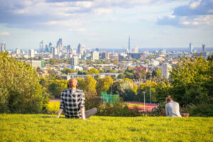Photo of a man at the top of Hampstead Heath London