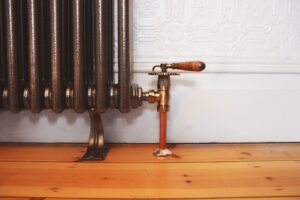 Photo of draining down a radiator of a central heating system